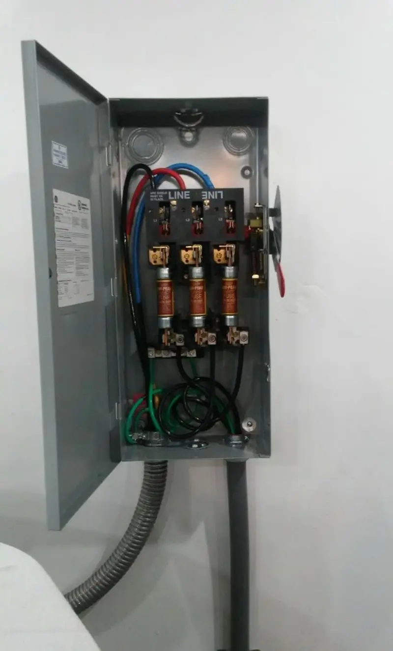 Three-phase disconnect switch installed for Smoke Detector Installation in Holmes Beach